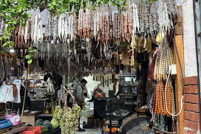 A Gastronomic Private Guided Journey Through Tbilisi - Rike Park: the Tree monument, Berlin Wall reference, and a political message