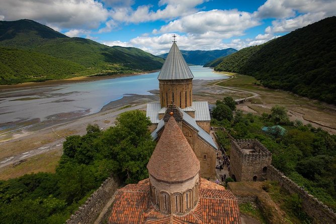 Adventure in Caucasus – Private Tour to Jinvali, Ananuri, Gudauri, Kazbegi - Gergeti Trinity Church (XIV Century) at 2200m: The Stepantsminda 4×4 Choice