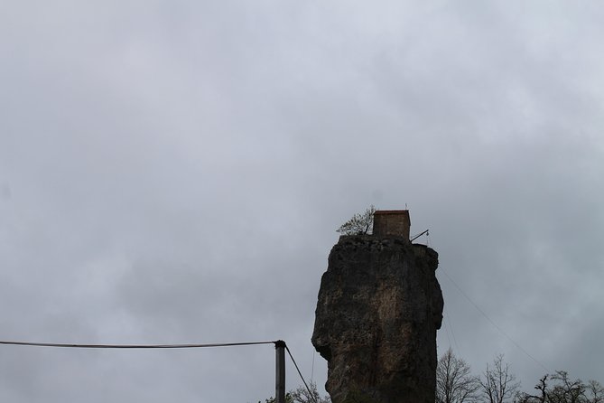 Chiatura. Soviet Past in the present. + Katskhi pillar - Mgvimevi Monastery: Steps, a Tunnel, Frescoes, and Stone Carving