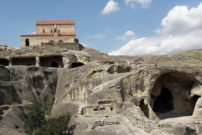 Day tour to Chronicles of Georgia, Gori city, Uplistsikhe cave - Stop 2: Gori and the Stalin Museum house, carriage, and artifacts