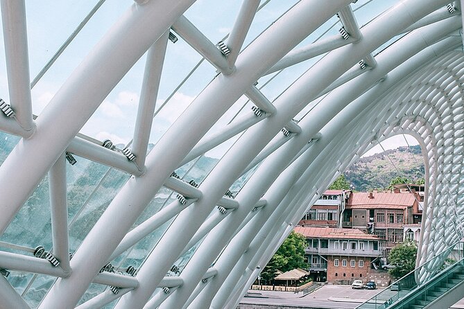 Explore Tbilisi Full Day Tour ( 3KM stroll rest by the car) - Clock Tower and Rezo Gabriadze: modern surprises on old streets