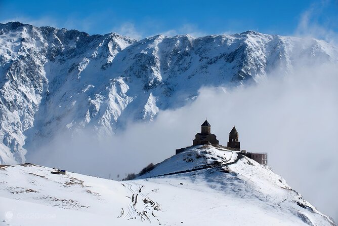 From Tbilisi Daytrip Kazbegi Gudauri & Zhinvali Guided Group Tour - Stepantsminda and Kazbegi: The Gergeti Trinity Church Decision