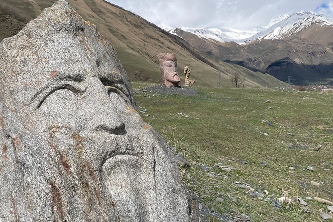 Kazbegi-Ananuri-Gudauri: Epic Views & History (Group) - Dariali Winery, Sno Giant Stone Heads, and Elia Mountain