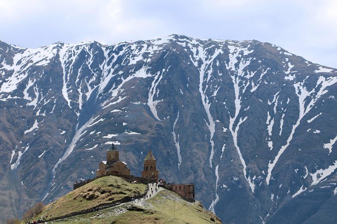 Kazbegi, Gergeti and Ananuri Full Day Tour from Tbilisi - Zhinvali Dam: A Quick Stop With Unusual Water Views