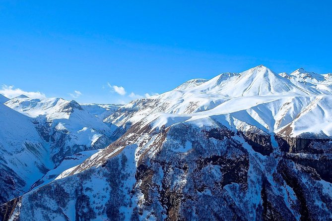 Kazbegi, Gergeti and Ananuri Full Day Tour from Tbilisi - Russian-Georgian Friendship Monument and the Viewpoint Break