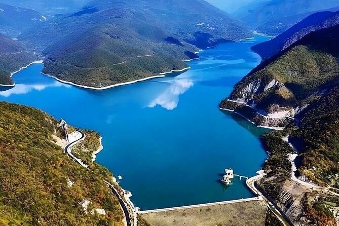 Magical Kazbegi Gudauri & Ananuri DayTrip GuidedTour from Tbilisi - Zhinvali Dam: turquoise water and a calmer pace