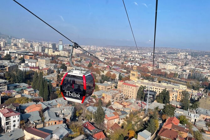 New Cable Car Mtatsminda with Three Lagidze Lemonade Tasting - Stop 1: Mtatsminda Amusement Park time—fun with a walking reality check
