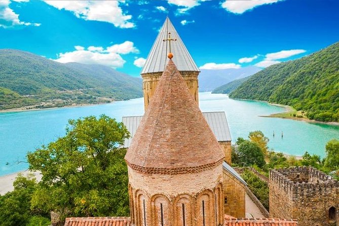 Private Day Tour to Kazbegi and Gudauri - Gergeti Trinity Church: the postcard view, plus the 4WD reality