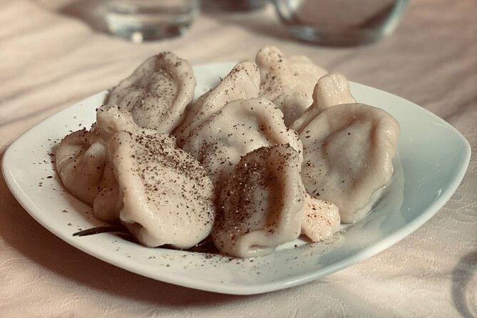 Taste of Georgia. Cooking-Class Khinkali, Khachapuri and more - Adjarian khachapuri: dough, stretchy cheese, and the egg yolk finish