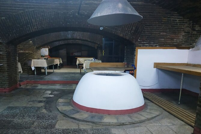 Tbilisi Walking Tour with Cable Car, Wine Tasting & Bread Bite - Narikala Fortress: an old citadel with modern-city sightlines