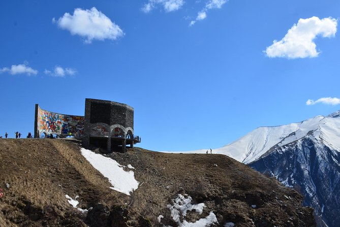 Tour to Kazbegi: Georgian Military Road – Ananuri – Gudaury – Kazbegi - Mineral springs and travertine rock: stop, touch the geology, drink narzan